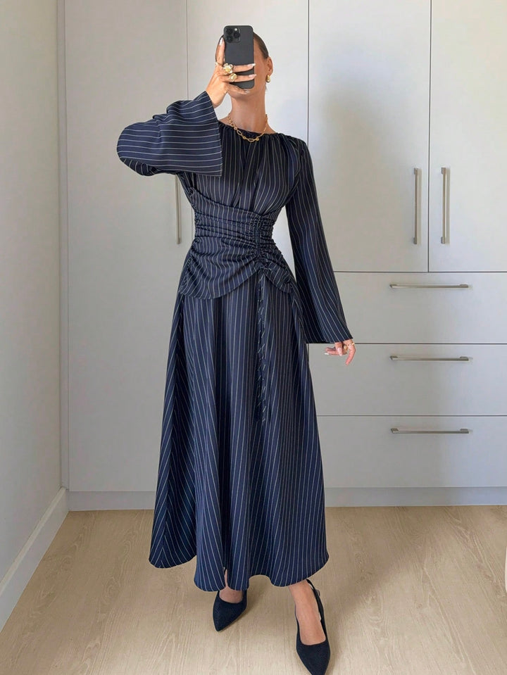 Women's maxi dress with gathered waist lacing, wide sleeves, and flowing skirt Mune Fashion
