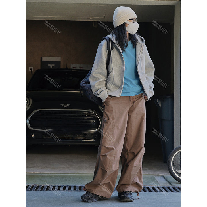 Women short cut hooded zip jacket with dropped shoulder and kangaroo pockets Mune Fashion