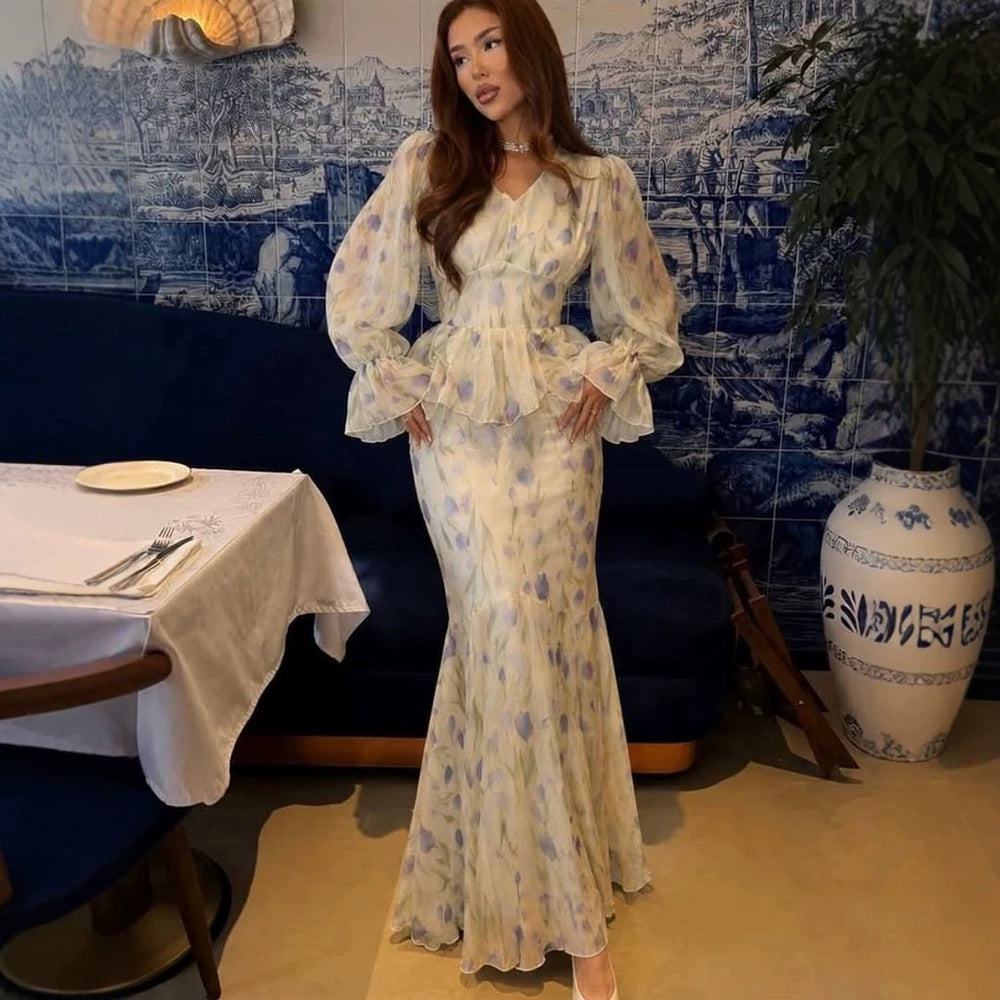 Women's dress made of transparent chiffon with fitted bodice, ruffled peplum and voluminous bell sleeves Mune Fashion