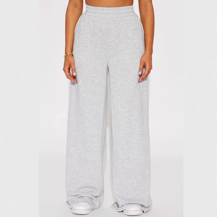 Ladies high-waist palazzo trousers made of French terry with wide legs, elastic comfort waistband and open hem edges Mune Fashion