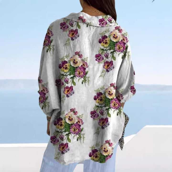 Women's lightweight linen-look shirt blouse with floral pattern, loose fit, roll-up sleeves, and patch pockets Mune Fashion