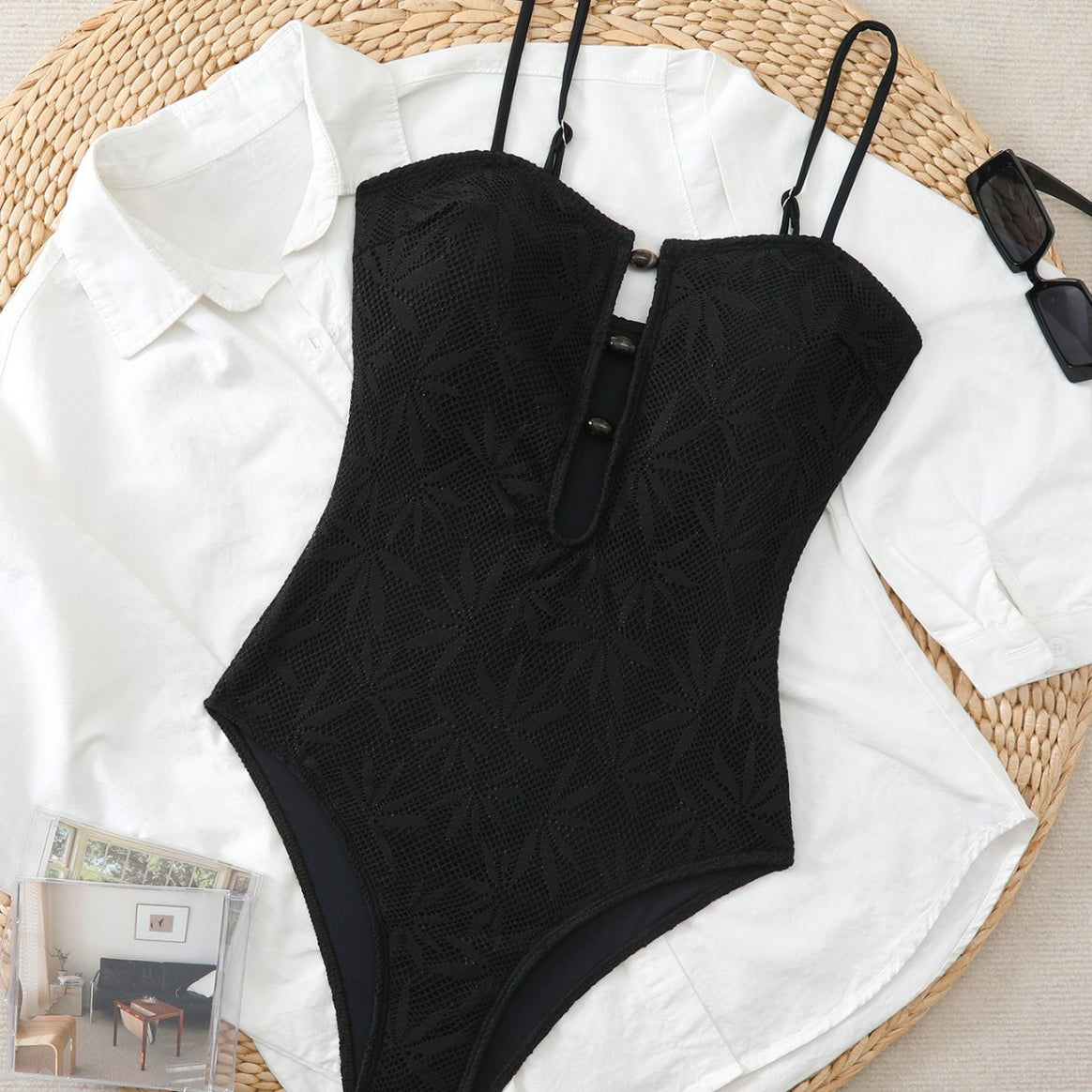 Ladies one-piece swimsuit with decorative mesh design and elegant keyhole neckline Mune Fashion