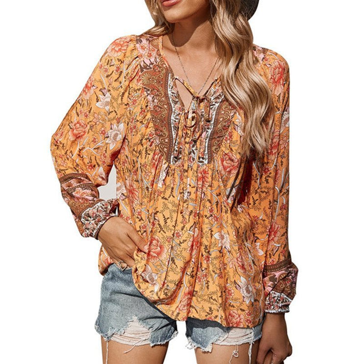 Ladies Boho blouse with floral print, V-neck with tie and pleat details Mune Fashion