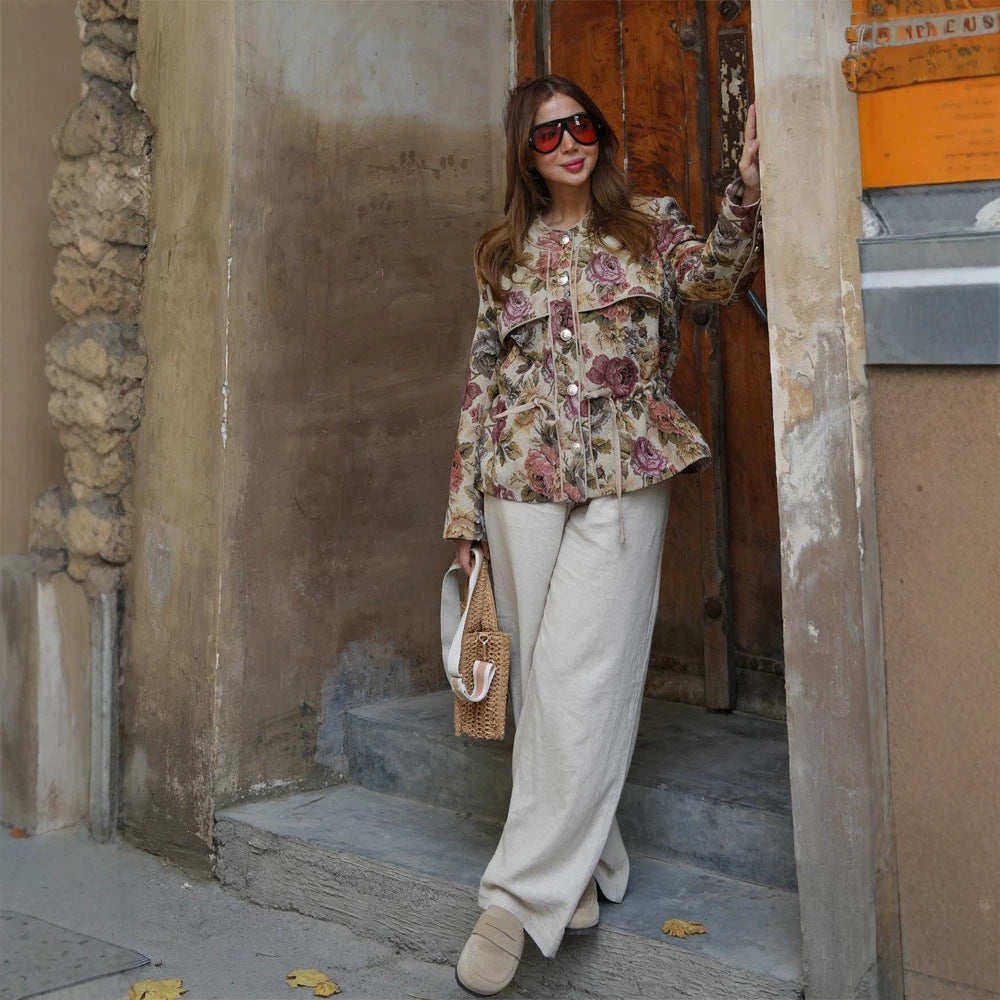 Ladies short jacquard blouson jacket with floral weave pattern, drawstring waist and pearlescent buttons Mune Fashion