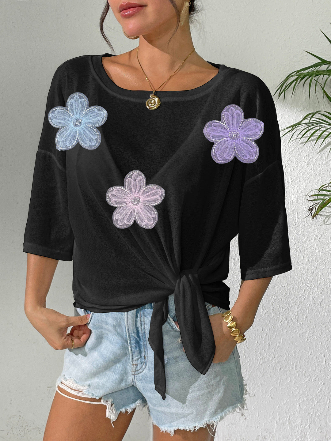 Women's casual top with floral design and side knot Mune Fashion