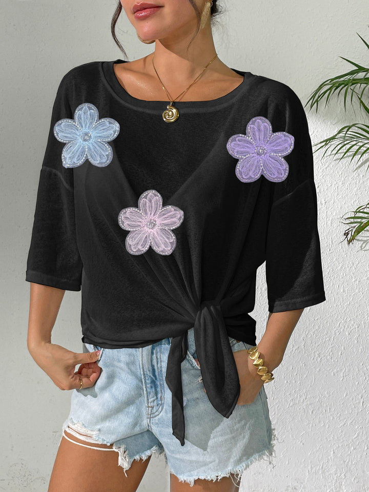 Women's casual top with floral design and side knot Mune Fashion
