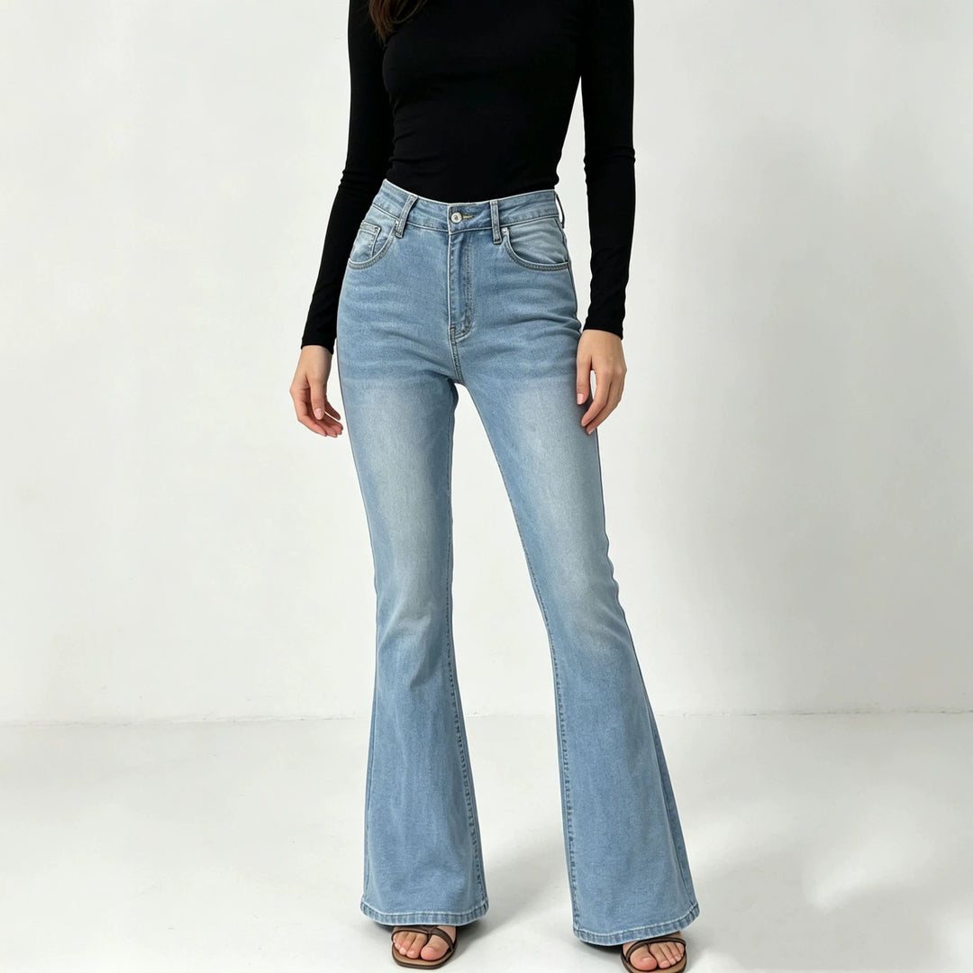 Ladies high-waisted jeans with a narrow hip area and wide flare with elastic waistband Mune Fashion