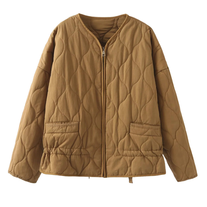 Ladies' nan quilted lightweight transitional jacket with wave quilting, patch flap pockets, and drawstring hem Mune Fashion