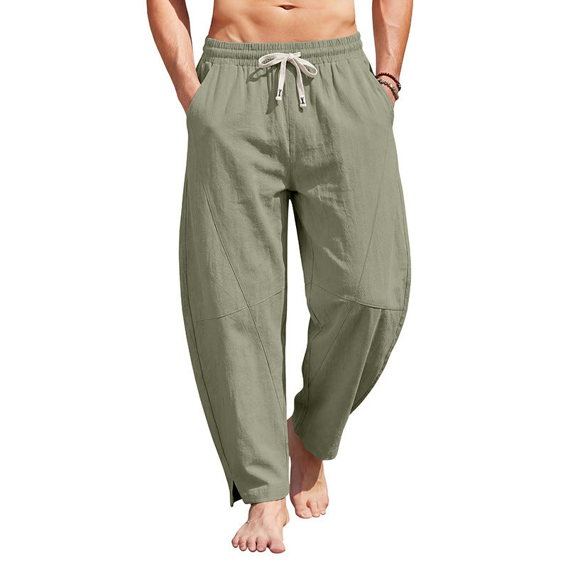 Men's ankle-length casual trousers made of linen blend with elastic drawstring waistband and side slits.