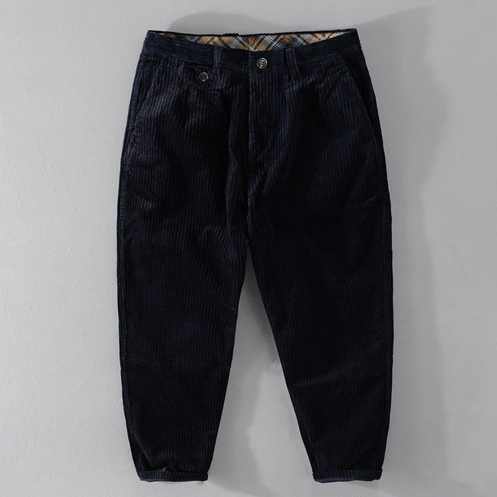 Men's corduroy pants with a tapered cut, high waistband, checked inner band, and rolled hem Mune Fashion