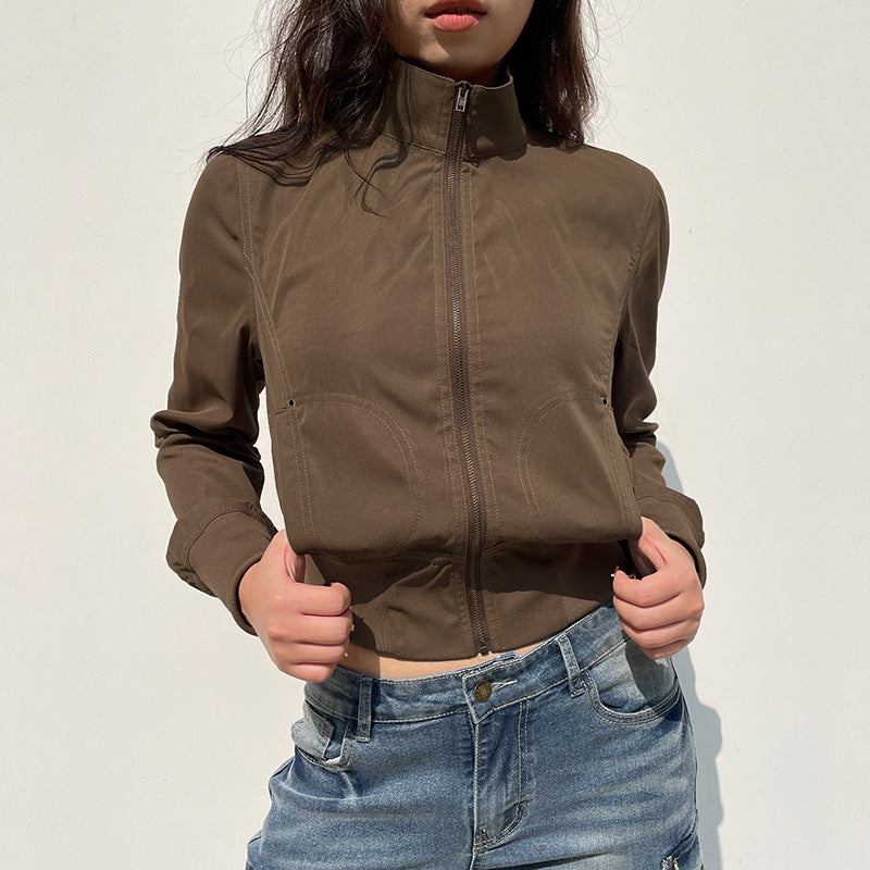 Women's tailored short jacket with stand-up collar, continuous zip and elastic waistband Mune Fashion