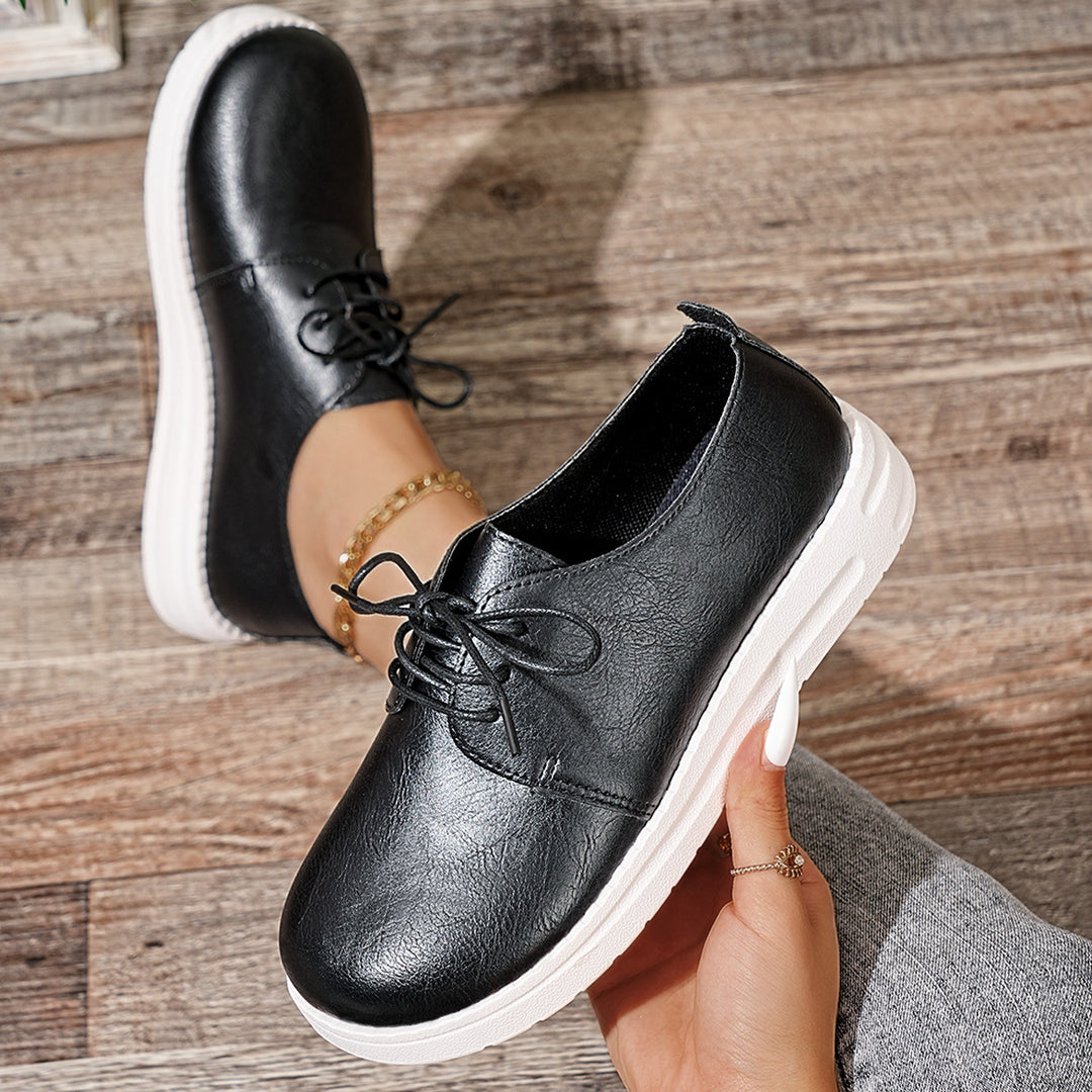 Women's lace-up sneakers made of synthetic leather with a cushioned comfort footbed and light profile sole Mune Fashion
