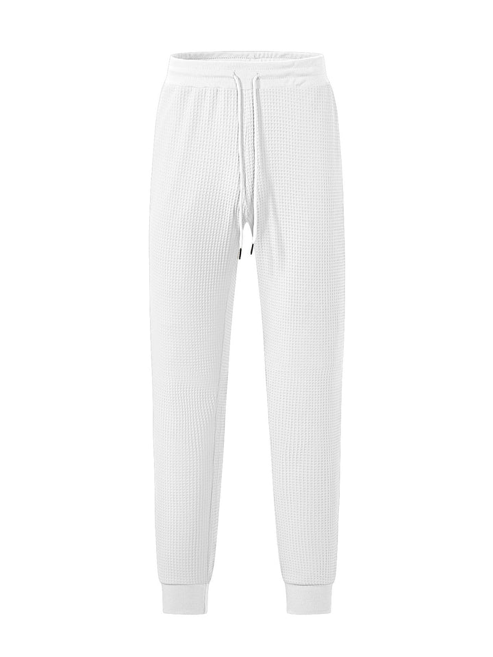 Men's fine-structured jersey lounge pants tapered cut with drawstring waistband and ribbed leg openings Mune Fashion