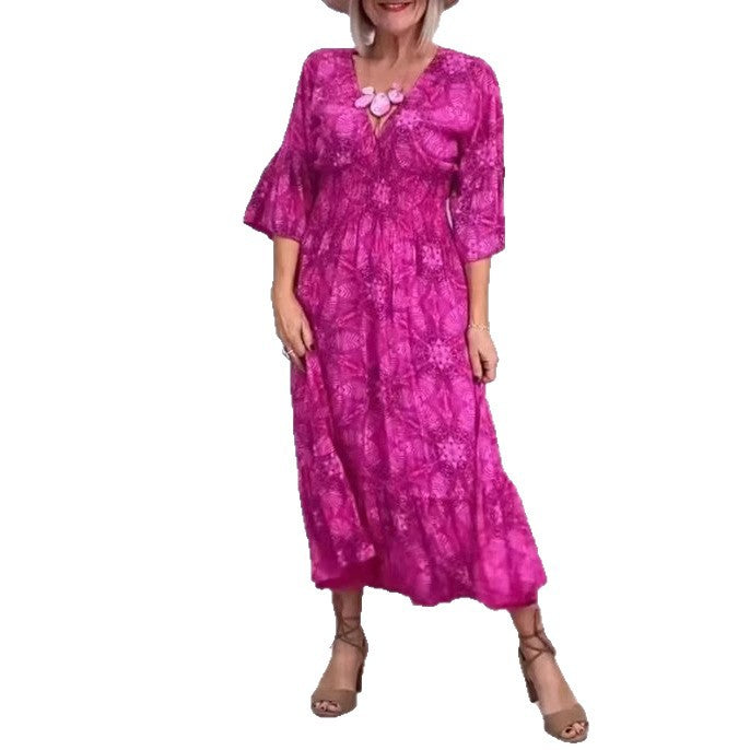 Women's flowing kaftan midi dress with V-neck, loose silhouette, tiered skirt, and three-quarter sleeves Mune Fashion