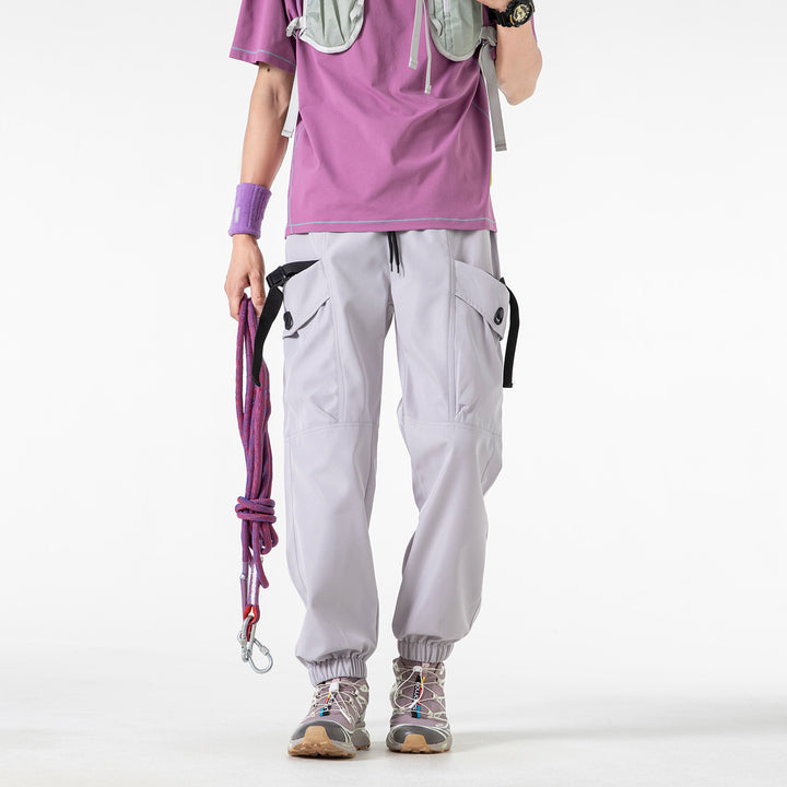 Unisex Wide Technical CargoJogging Pants with adjustable drawstring, large flap pockets, and elastic ankle cuffs Drune