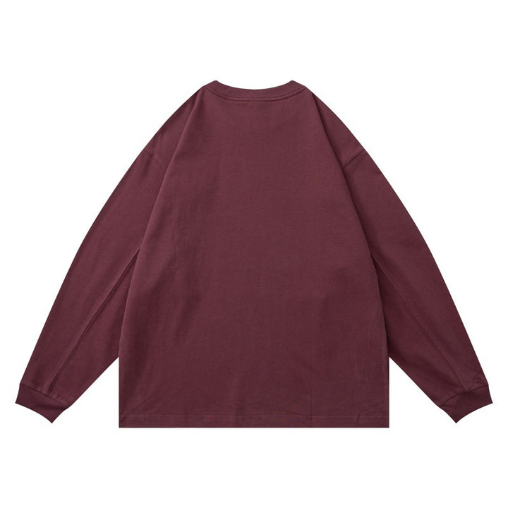 Unisex Oversize Long Sleeve Shirt made of heavy cotton blend with round neck and subtle chest embroidery Mune Fashion