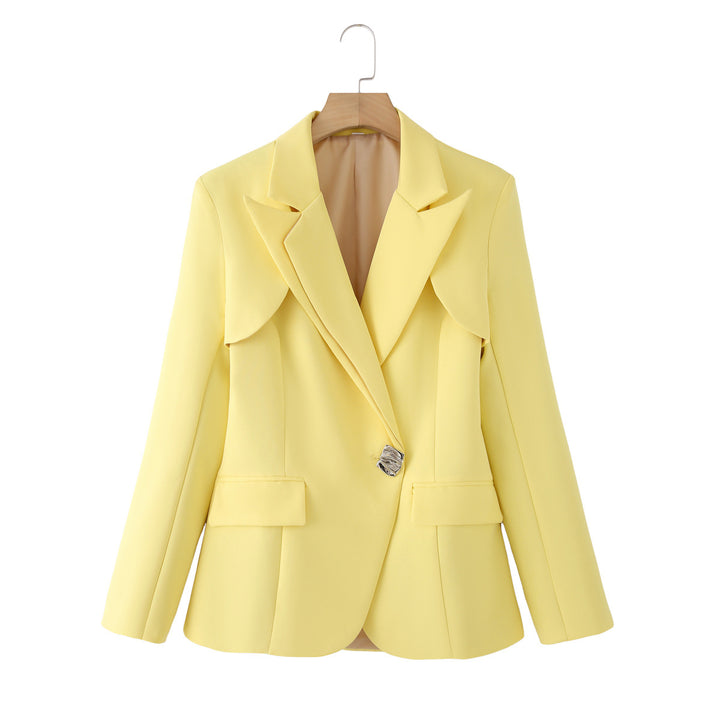 Women's tailored blazer with curved layered collar, figure-flattering darts, and decorative accent button Mune Fashion