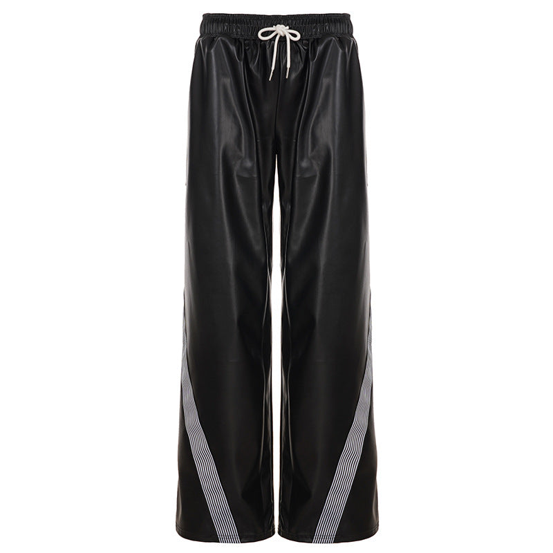 Ladies wide faux leather track pants with elastic waistband, drawstring and side stripes Mune Fashion