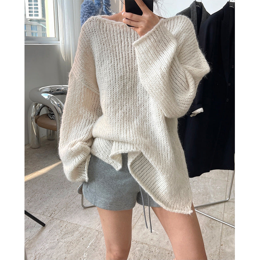 Ladies chunky knit oversized sweater with crew neck and extended hem Mune Fashion