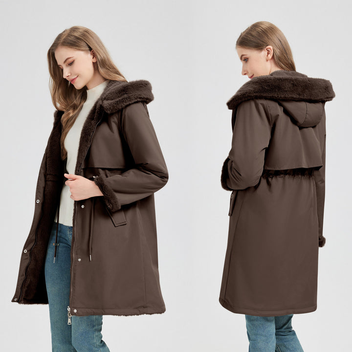 Women's tailored long thermal parka with faux fur trim on hood and sleeves as well as drawstring waist Mune Fashion