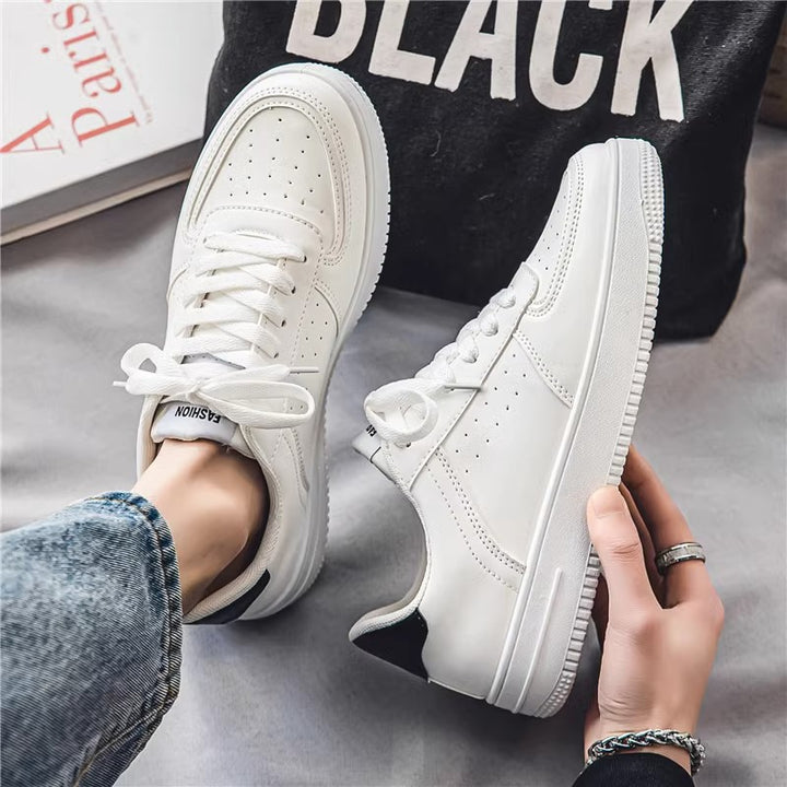 Unisex minimalist Low-Top court sneaker with perforated upper material, padded heel collar and shock-absorbing sole Mune Fashion