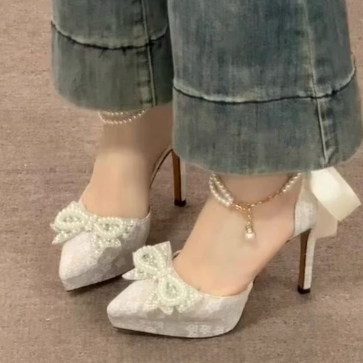 Ladies' satin pumps with lace overlay, pearl bow appliqué, and pearl lacing Mune Fashion