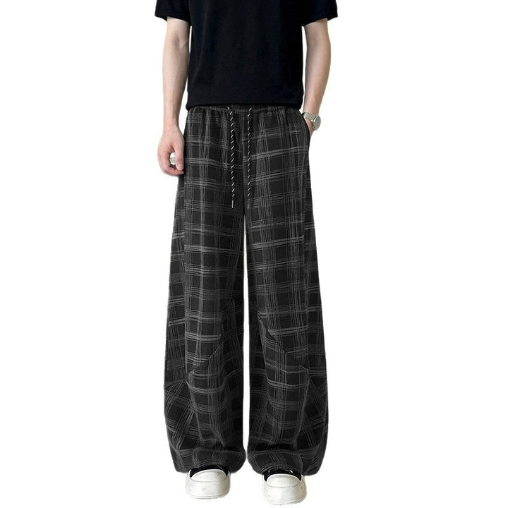 Men's wide checkered lounge pants with elastic waistband and drawstring