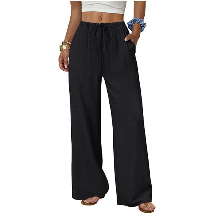 Women's lounge pants with wide leg, elastic waistband and side pockets Mune Fashion