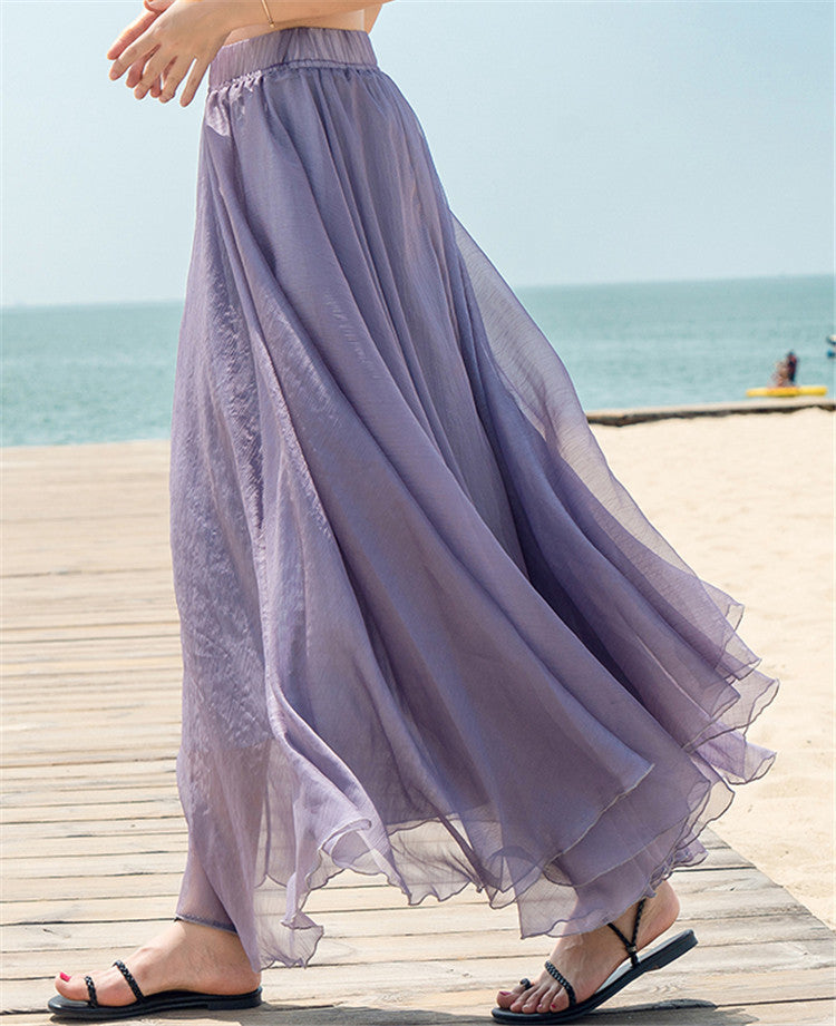 Women's flowing maxi skirt made of chiffon with elastic waistband and layered ruffle Mune Fashion