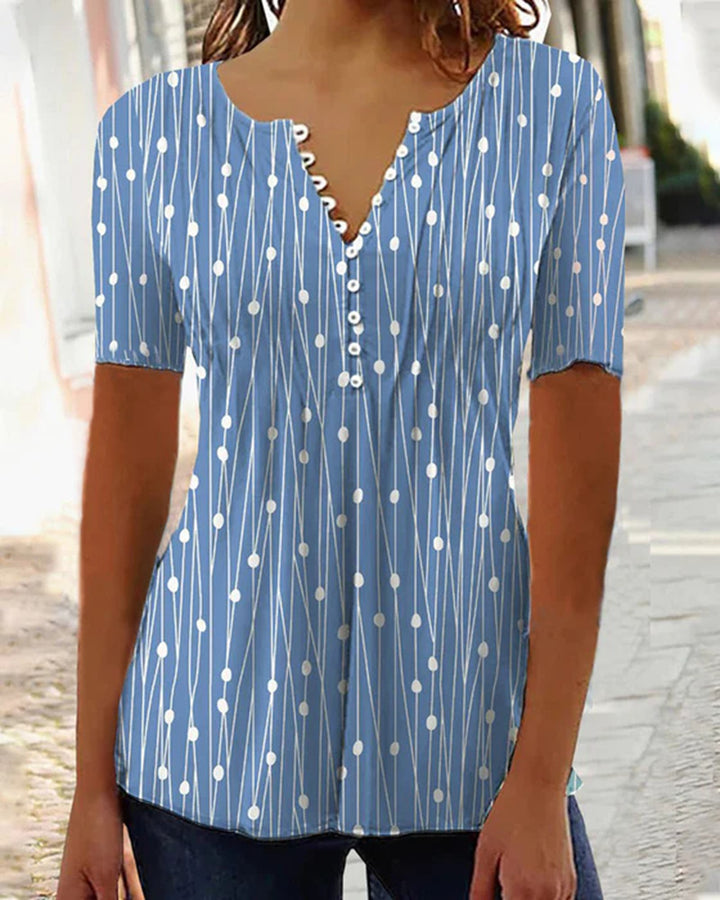 Women's airy V-neck blouse with short sleeves, decorative button placket and graphic dot stripe pattern Mune Fashion