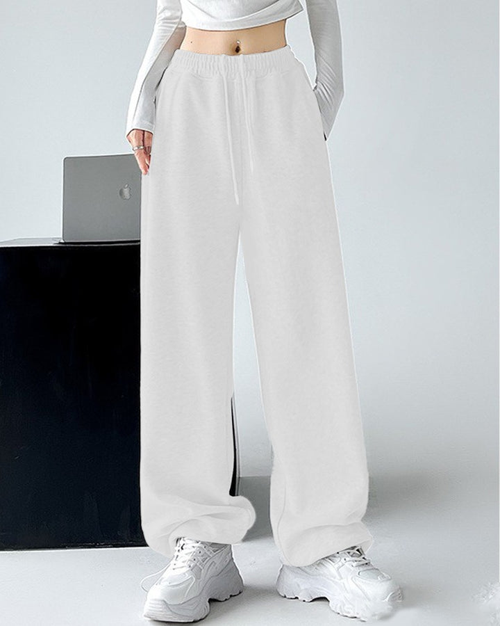 Ladies Nan extra wide palazzo sweatpants with high comfort waistband, side pockets, slit at hem and drawstring Mune Fashion