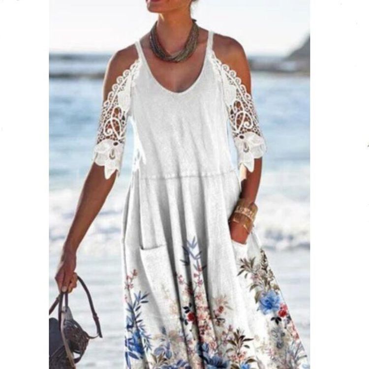 Women’s flowing maxi dress with shoulder cutouts crochet lace sleeves A-line cut and side pockets Mune Fashion