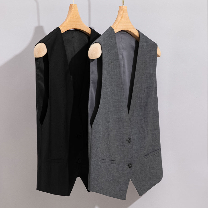Women's tailored sleeveless suit vest with subtle V-front and piped pockets Mune Fashion