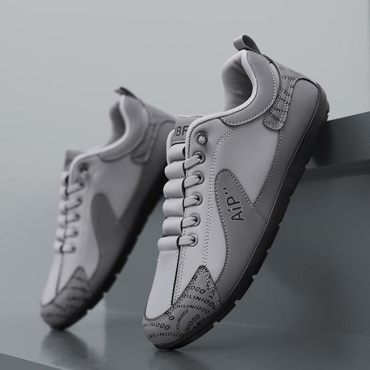Men's Modern Low-Top Faux Leather Sneaker with Padded Collar and Treaded Rubber Sole Mune Fashion