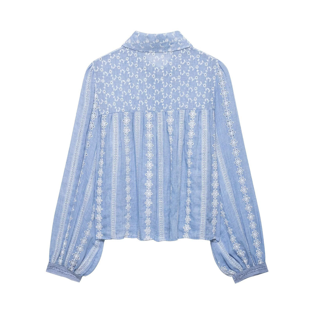 Women's loosely fitted embroidered blouse with broderie details, button placket, and voluminous balloon sleeves Mune Fashion