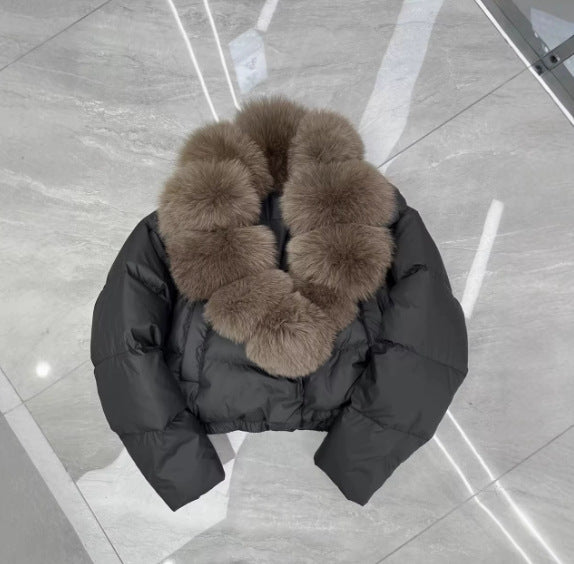 Women's short cut boxy puffer jacket with extra large faux fur collar and shape-stable hem Mune Fashion
