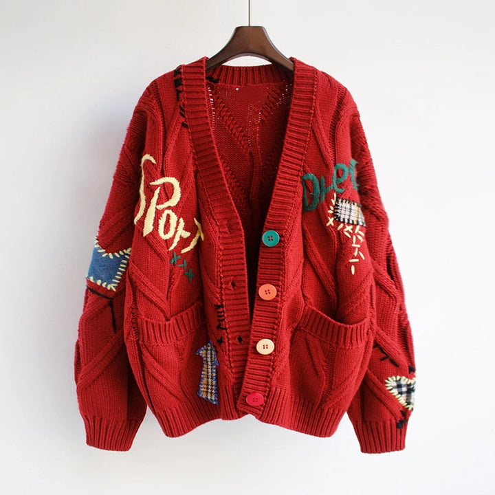 Women's fashionable knitted cardigan with colorful buttons and elaborate details