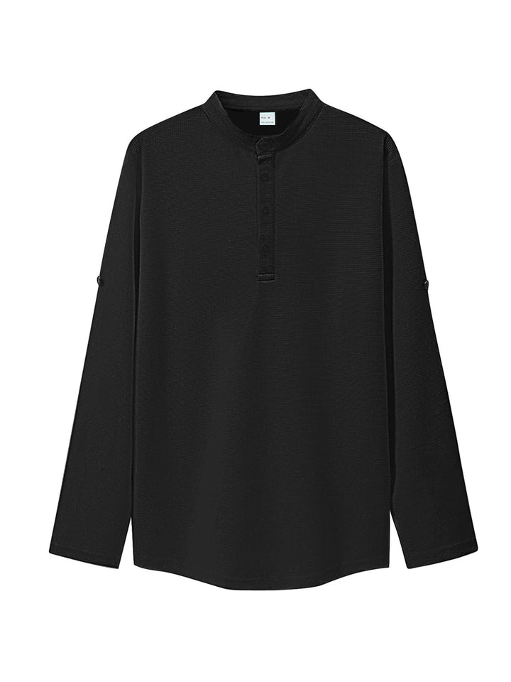 Women's oversized long sleeve Henley with stand-up collar waffle texture and sleeve fastening Mune Fashion
