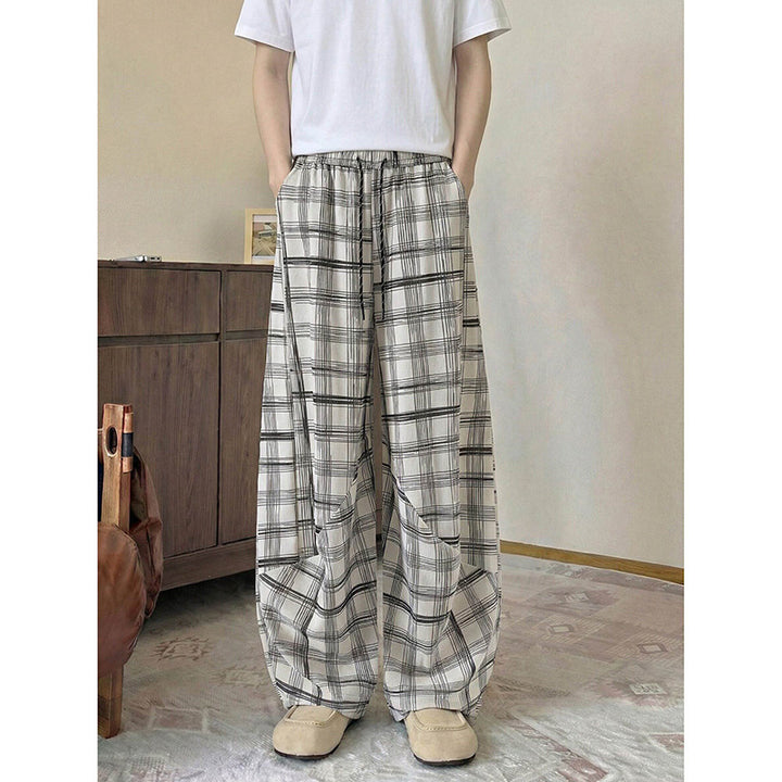 Men's wide checkered lounge pants with elastic waistband and drawstring