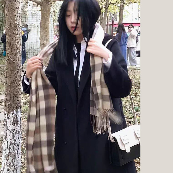 Women's longer classic wool blend coat in oversized cut with lapel collar and side pockets Mune Fashion