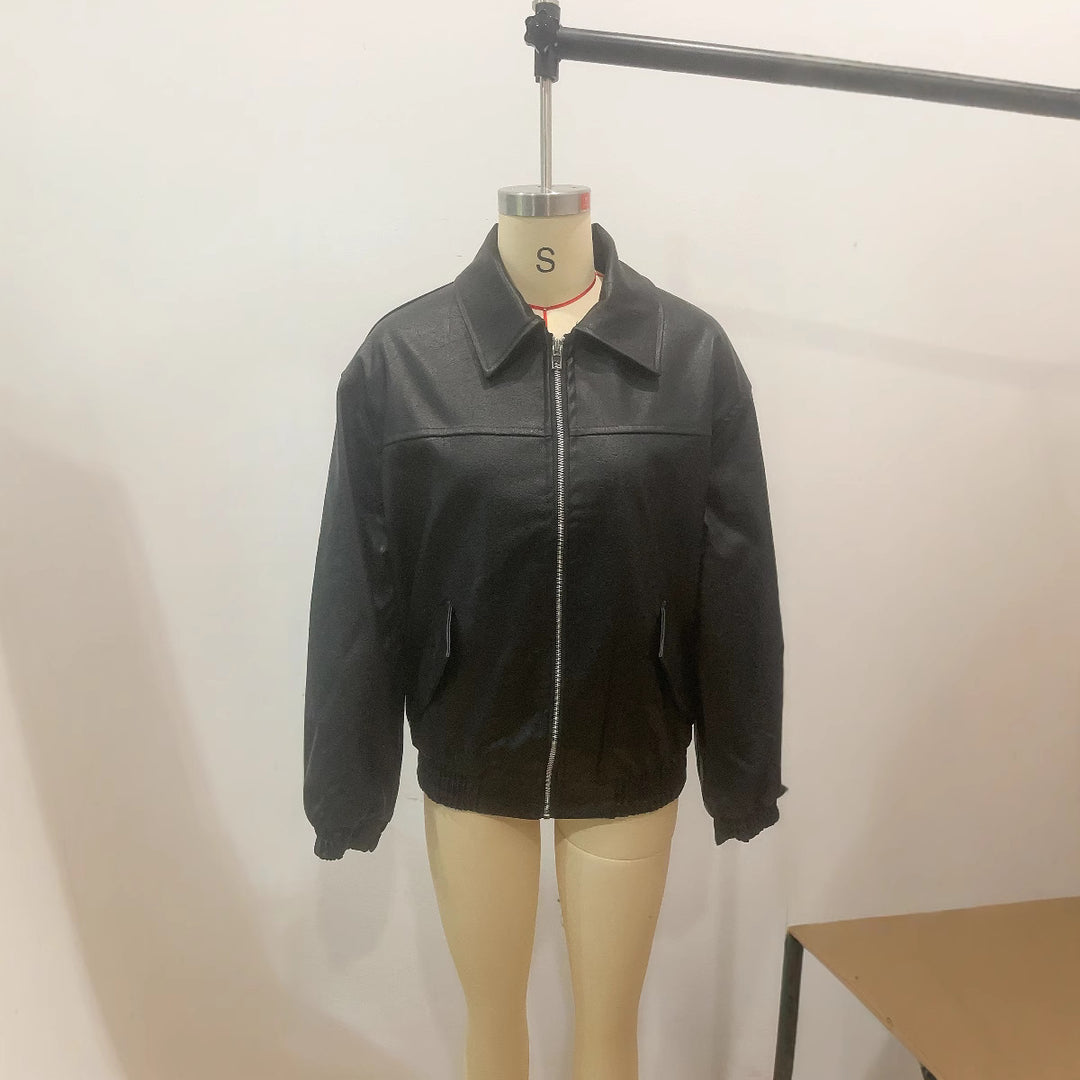 Women's oversized faux leather bomber jacket with shirt collar, elastic hem, and patch pockets Mune Fashion