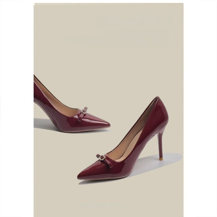Women's pointed toe patent pumps with high stiletto heel and crystal bow appliqué Mune Fashion