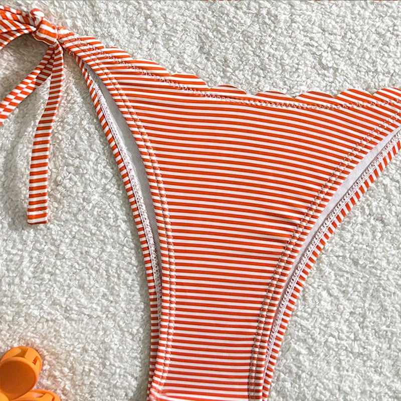 Women's triangle bikini with playful ruffle design and tie straps