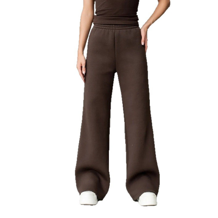 Women's flowing palazzo lounge pants with extra wide leg, elastic comfort waistband, and discreet side pockets Mune Fashion