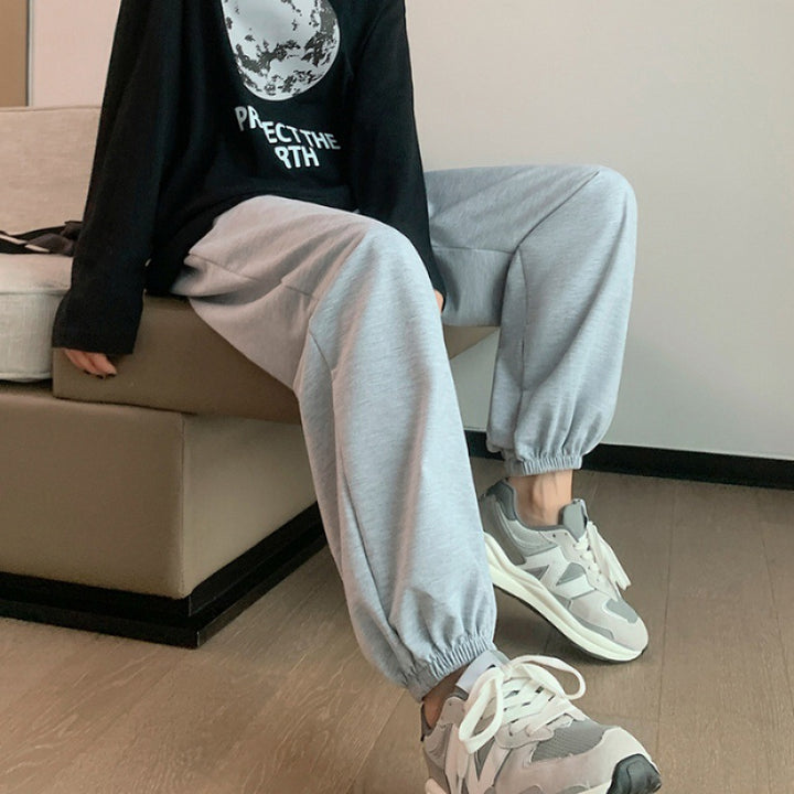 Women's relaxed-fit sweatpants with elastic drawstring waistband, side pockets, and stitched hem seams Mune Fashion
