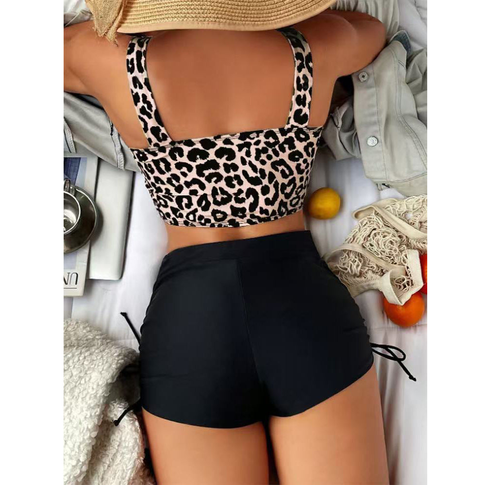 Women's bikini set with asymmetrical top and sporty shorts Mune Fashion