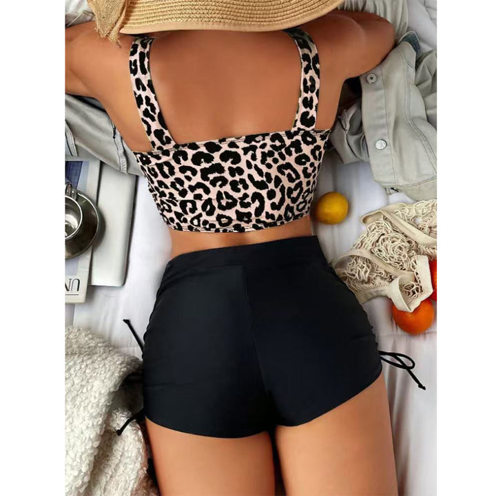 Women's bikini set with asymmetrical top and sporty shorts Mune Fashion