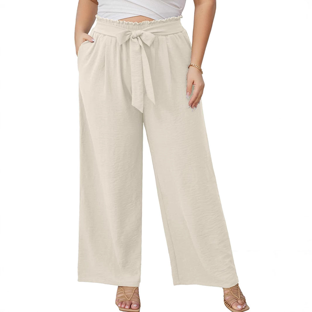 Women's paperbag pants with wide leg, elastic waistband, tie belt, and side pockets Mune Fashion