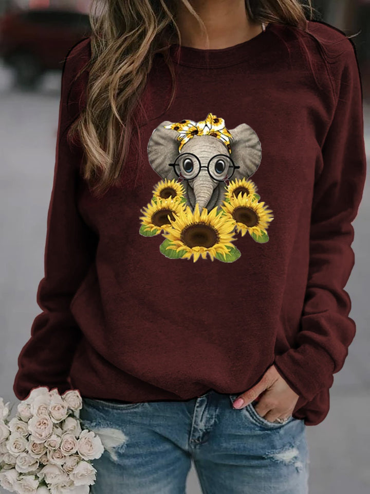 Women’s sweatshirt with elephant print, sunflower motif, and soft fleece Mune Fashion