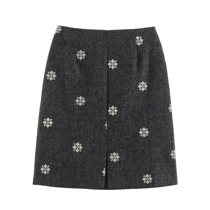 Women's wool blend pencil skirt with embroidered floral motifs and central slit Mune Fashion